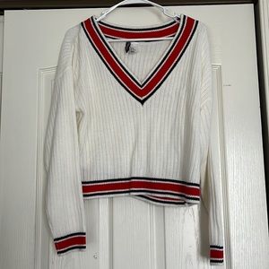 Medium sized sweater that’s never been worn.